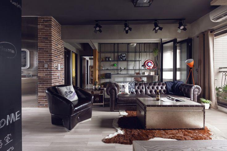 Leather furniture in an industrial-style living room interior