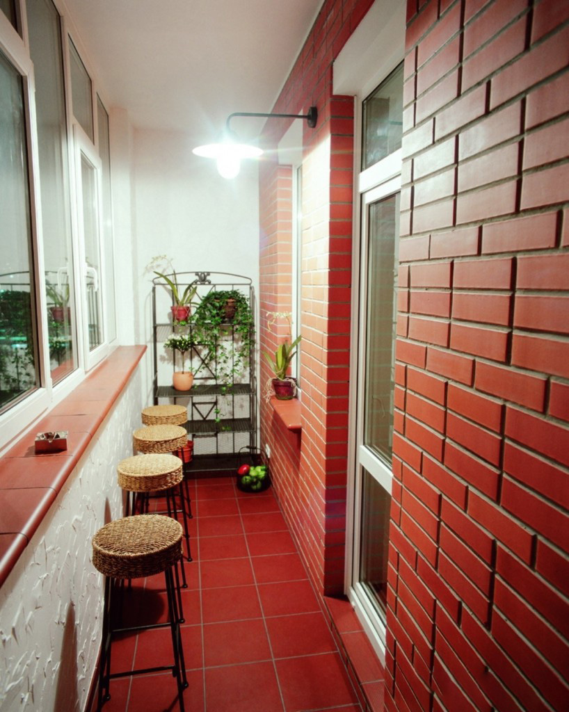Beautiful balcony with red brick wall