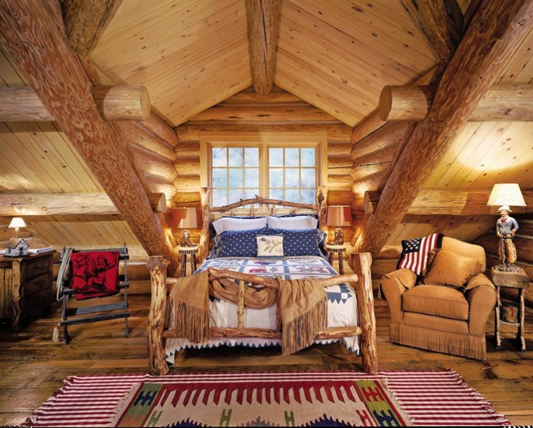Coarse wood bed in the attic of a country house