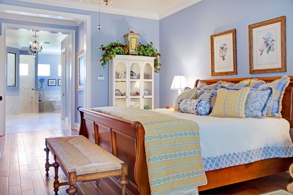 Baby blue walls in provence style bedroom