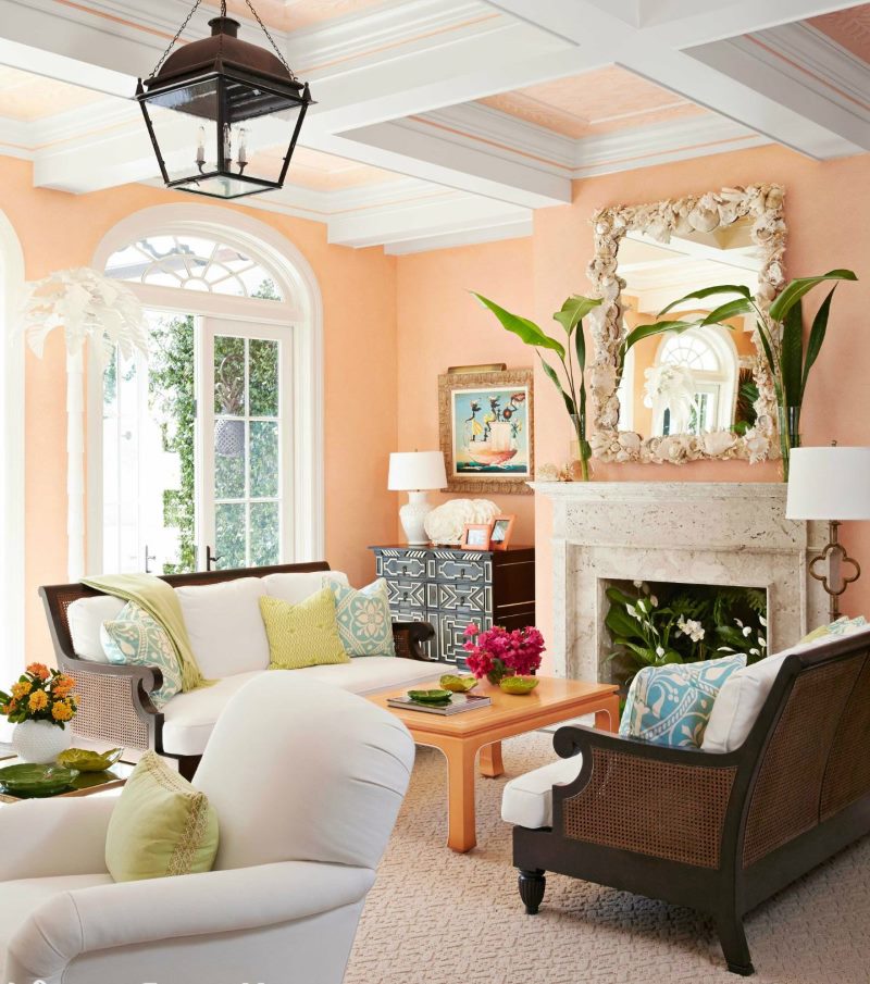 Living room interior with arched windows and peach walls