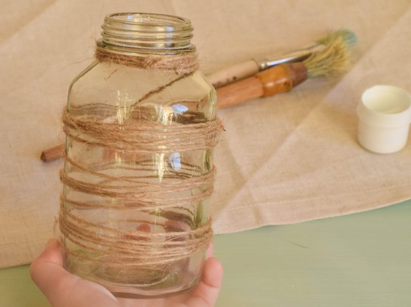 Glass jar with wound twine