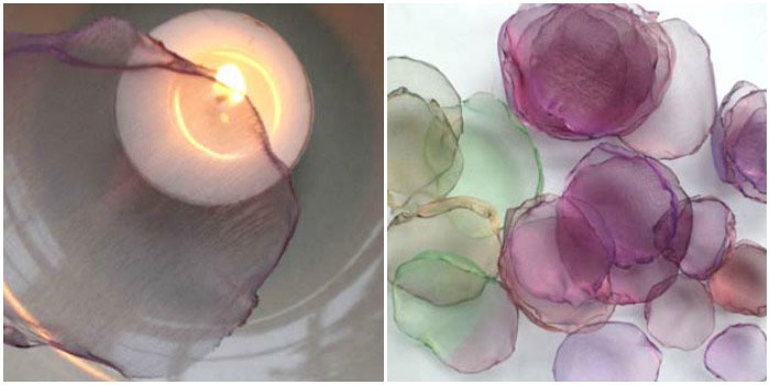 Apatiniai gėlių žiedlapių ruošiniai virš žvakės