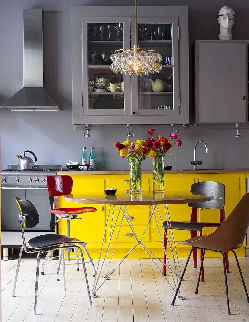 Gray kitchen with a yellow pedestal