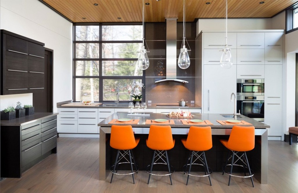 Orange bar stools in a modern kitchen