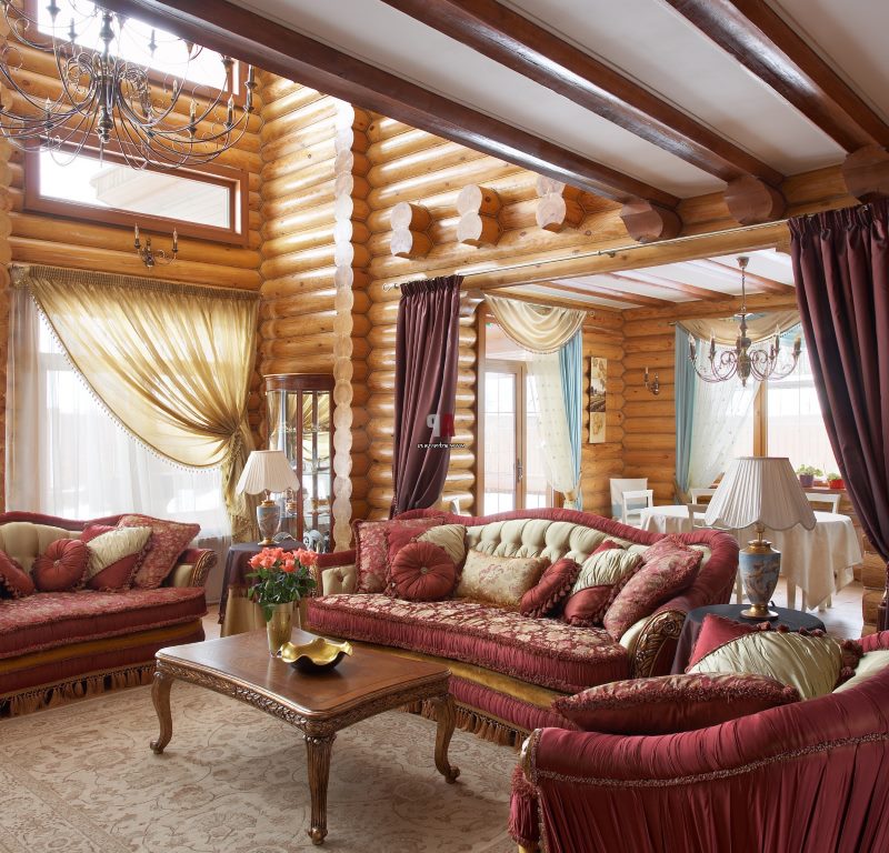 Comfortable soft sofas in the main hall of a private house