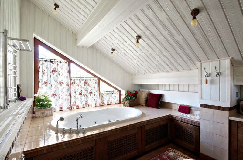 The interior of the bathroom in the attic of a country house