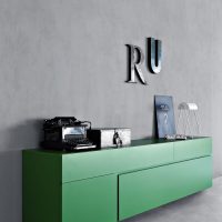 Hanging green chest of drawers without handles