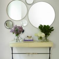 Composition of round mirrors of different sizes