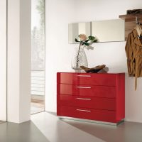 Hallway design with red chest of drawers
