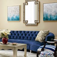 Variegated pillows on a blue sofa