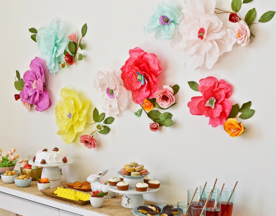 Paper flowers on a white wall of the living room