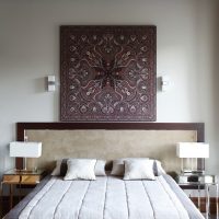 Oriental-style panel over the head of the bed
