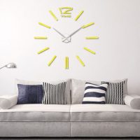 Clock decoration of the wall over the sofa