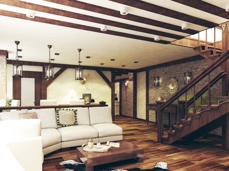 Spacious chalet-style living room with stairs in a duplex apartment