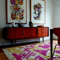 Colorful carpet with embroidery on the living room floor