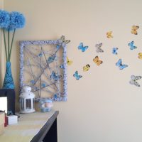 Colored butterflies on a living room wall
