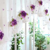 White curtain with lilac flowers