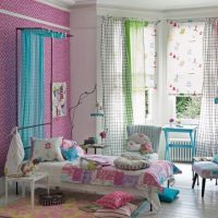 Interior of a kids room with colorful curtains