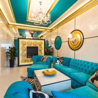 Turquoise furniture in a white living room