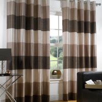 Striped curtains in the design of the living room