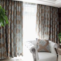 Gray print on brown curtains
