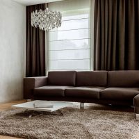 Brown sofa with faux leather upholstery