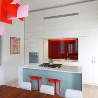 White kitchen with red accents