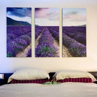 Triptych on the wall of a modern bedroom