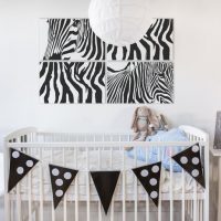 Crib for a newborn in a bright room