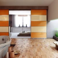Glass partition with orange stripes