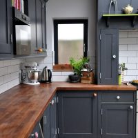 Wooden worktop with gray doors