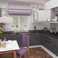 Lilac curtains in the interior of a gray kitchen