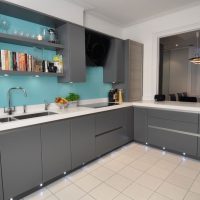 Blue wall in a gray kitchen