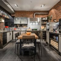 Kitchen design with brick wall.