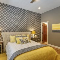 Gray wallpaper on the walls of the bedroom