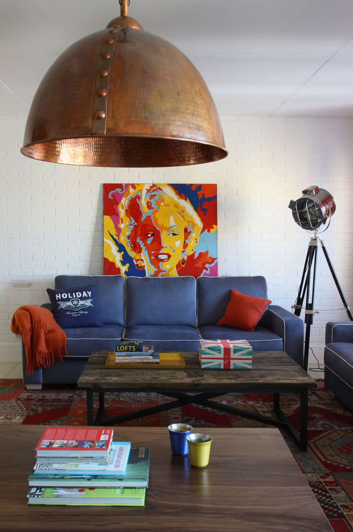 Large copper lamp on the ceiling of the living room in pop art style