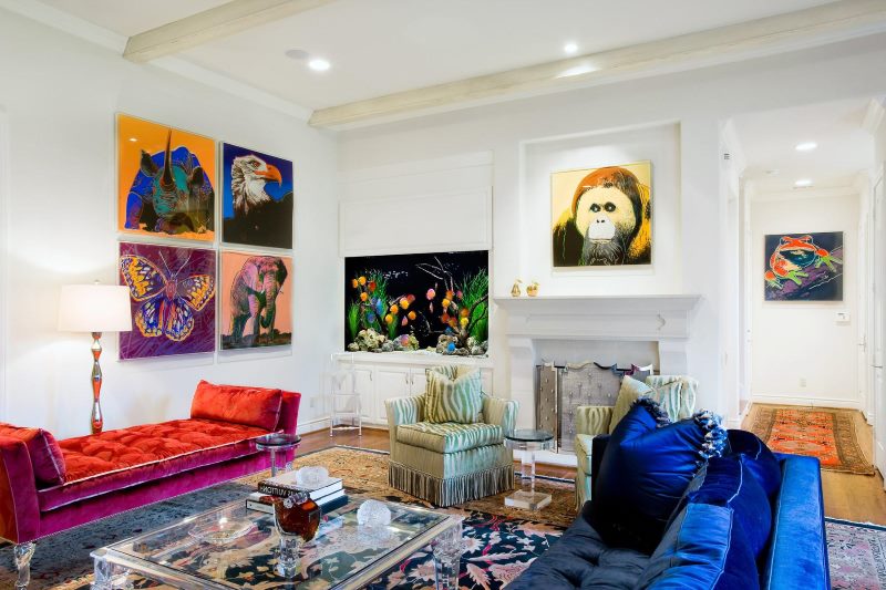 Paintings on white walls with images of different animals
