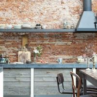 Old brick wall in industrial style kitchen