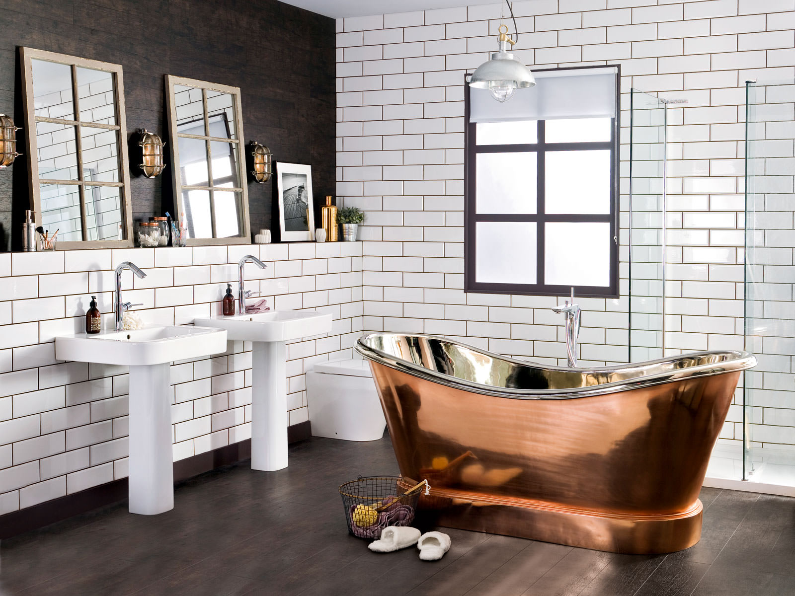 Copper alloy bathtub in a room with white tiled walls