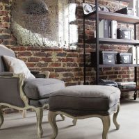 wooden armchair with gray upholstery