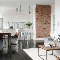 Kitchen-living room with a brick accent