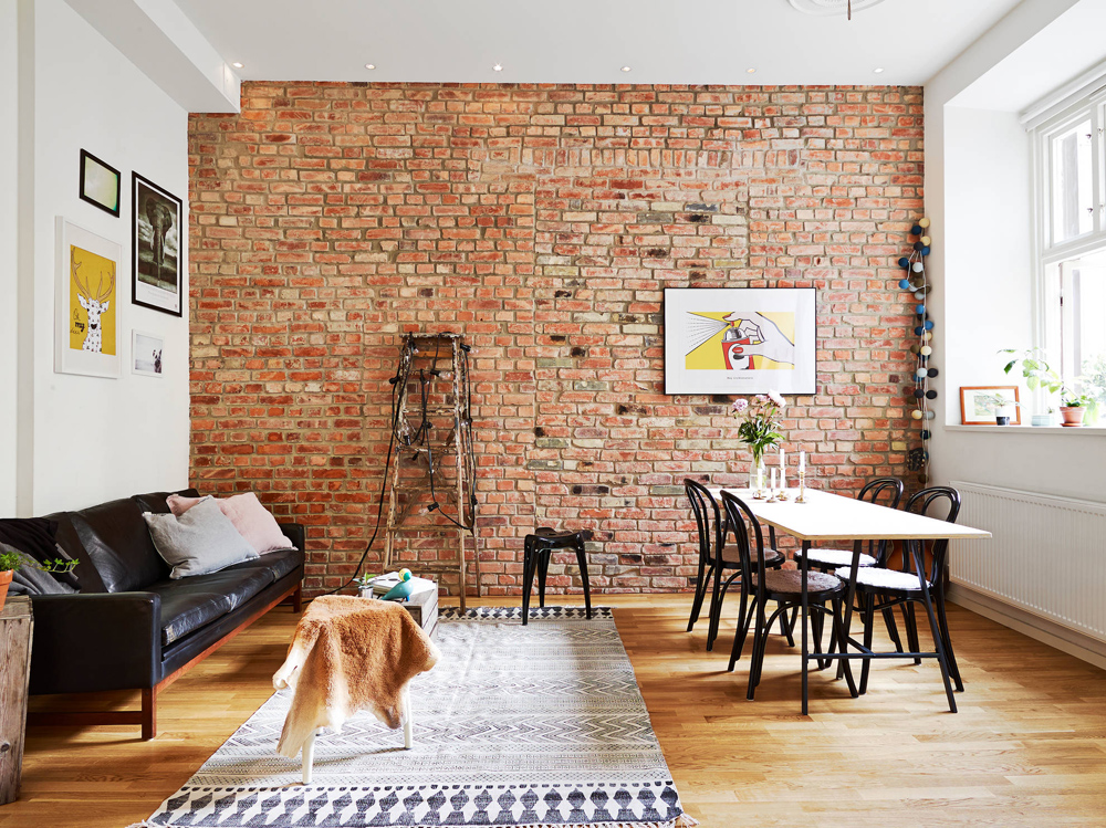 Accent brick wall in the living room interior