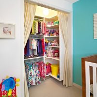 Curtains instead of a door in the pantry with children's things