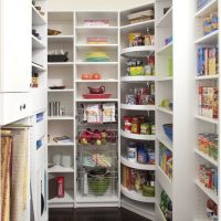 Roomy shelving in the design of the pantry