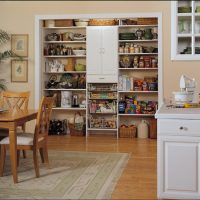 Pantry in the open niche of the kitchen-living room