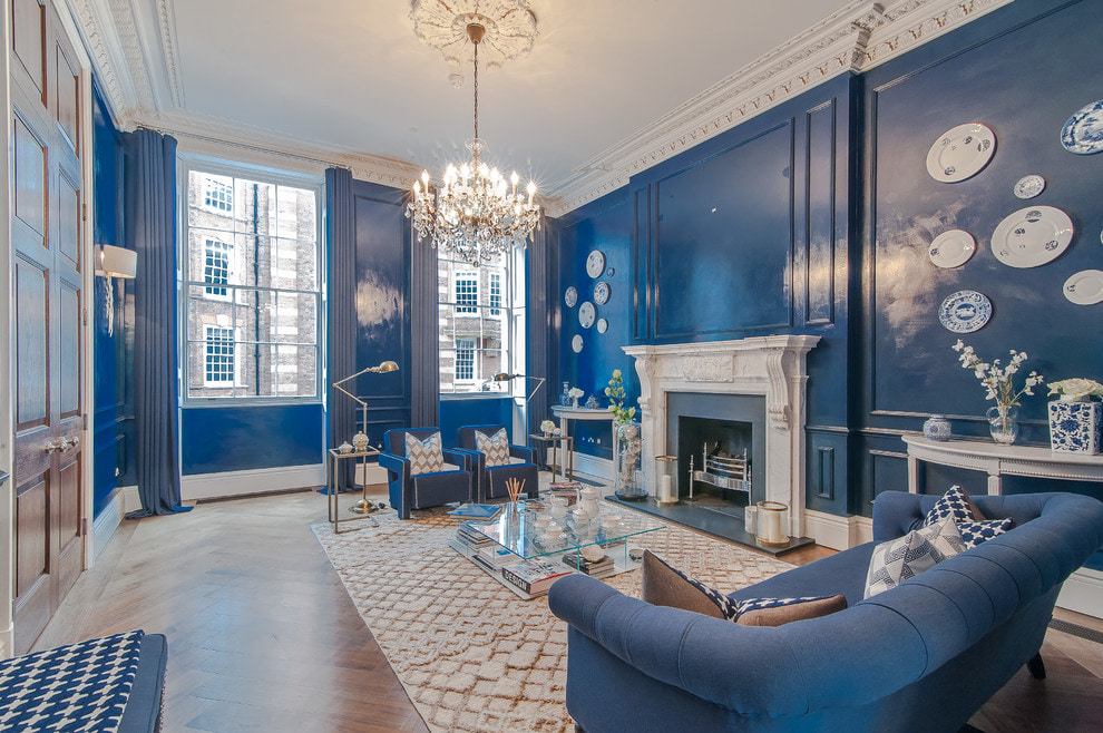 Classic living room design with blue walls.