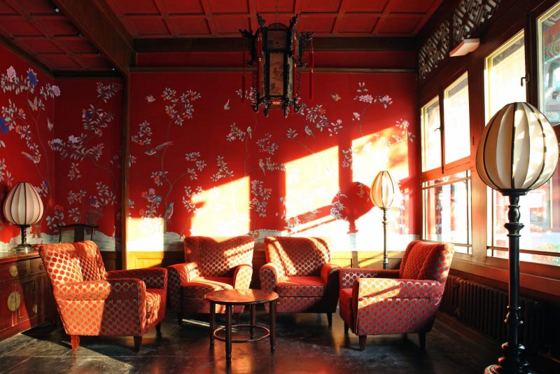 Red wallpaper in a chinese style living room