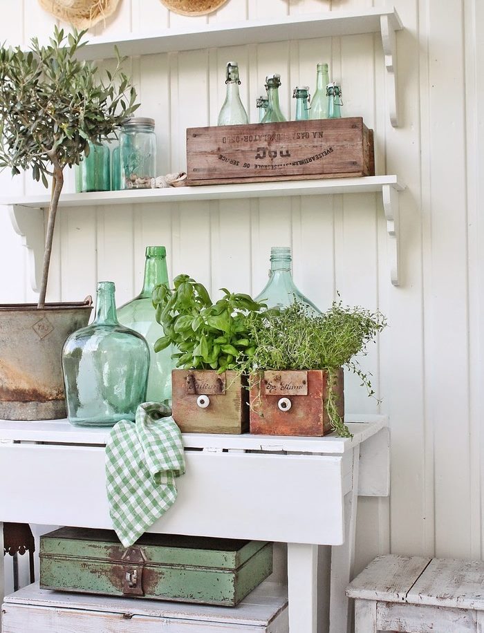 Wooden drawers with herbs in the kitchen interior