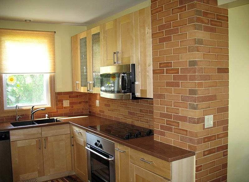 Small kitchen with brick trim
